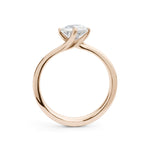 Solitaire Round Brilliant Cut Diamond Engagement Ring with a Twist in Rose Gold
