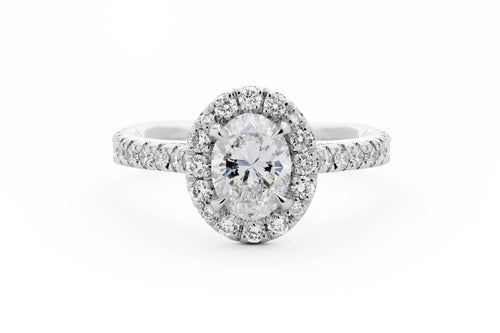 Oval Cut Diamond Halo Engagement Ring in Platinum