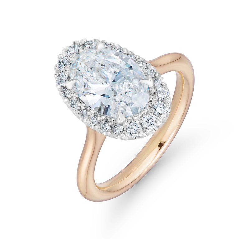 Large Oval Cut Ballerina Diamond Halo Engagement Ring in Rose Gold