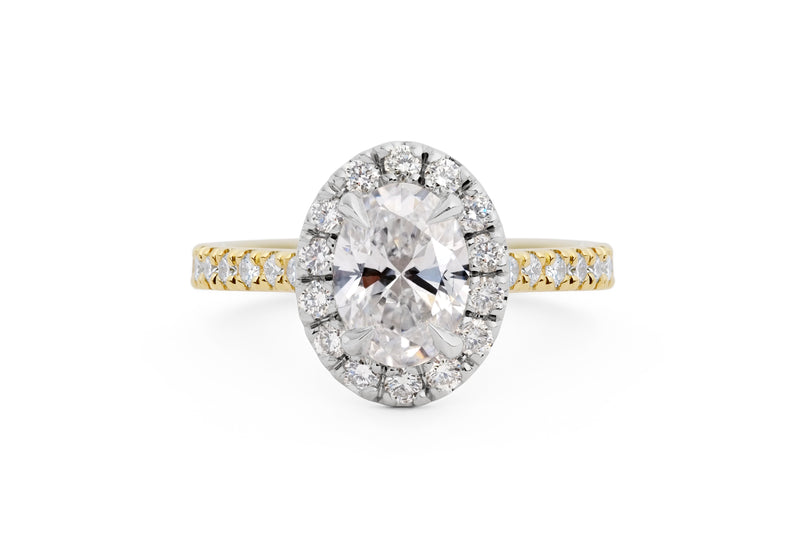 Oval Cut Diamond Halo Engagement Ring in Yellow Gold