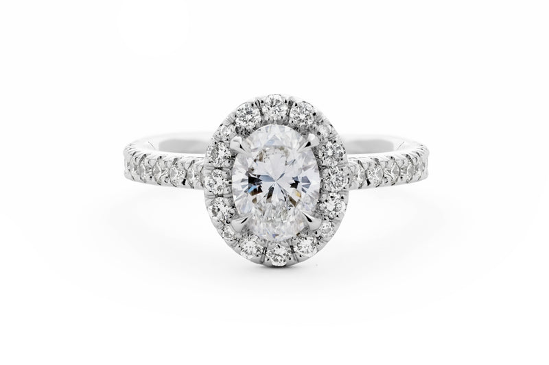 Oval Cut Diamond Halo Engagement Ring in Platinum